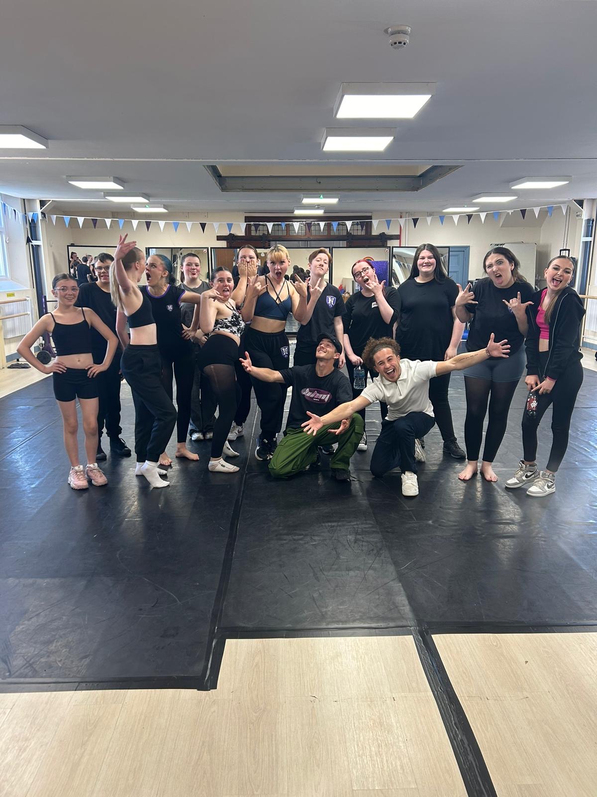 Young performers working together in a studio
